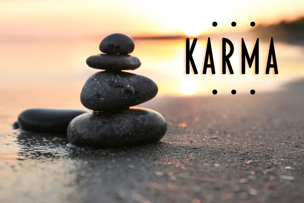 Karma has many definitions, especially in Buddhism and Hinduism.
An example of karma is in the sayings 